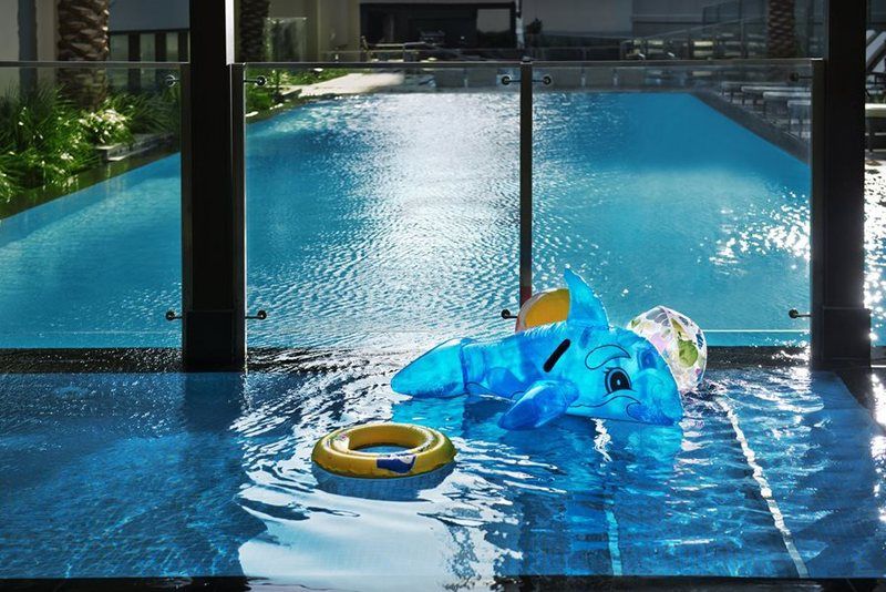 Damac Maison The Vogue ดูไบ ภายนอก รูปภาพ The swimming pool at the Ritz-Carlton, Singapore