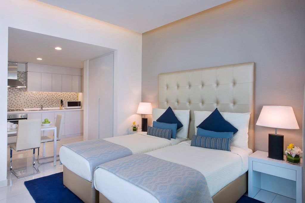 Damac Maison The Vogue ดูไบ ภายนอก รูปภาพ A bedroom at the hotel