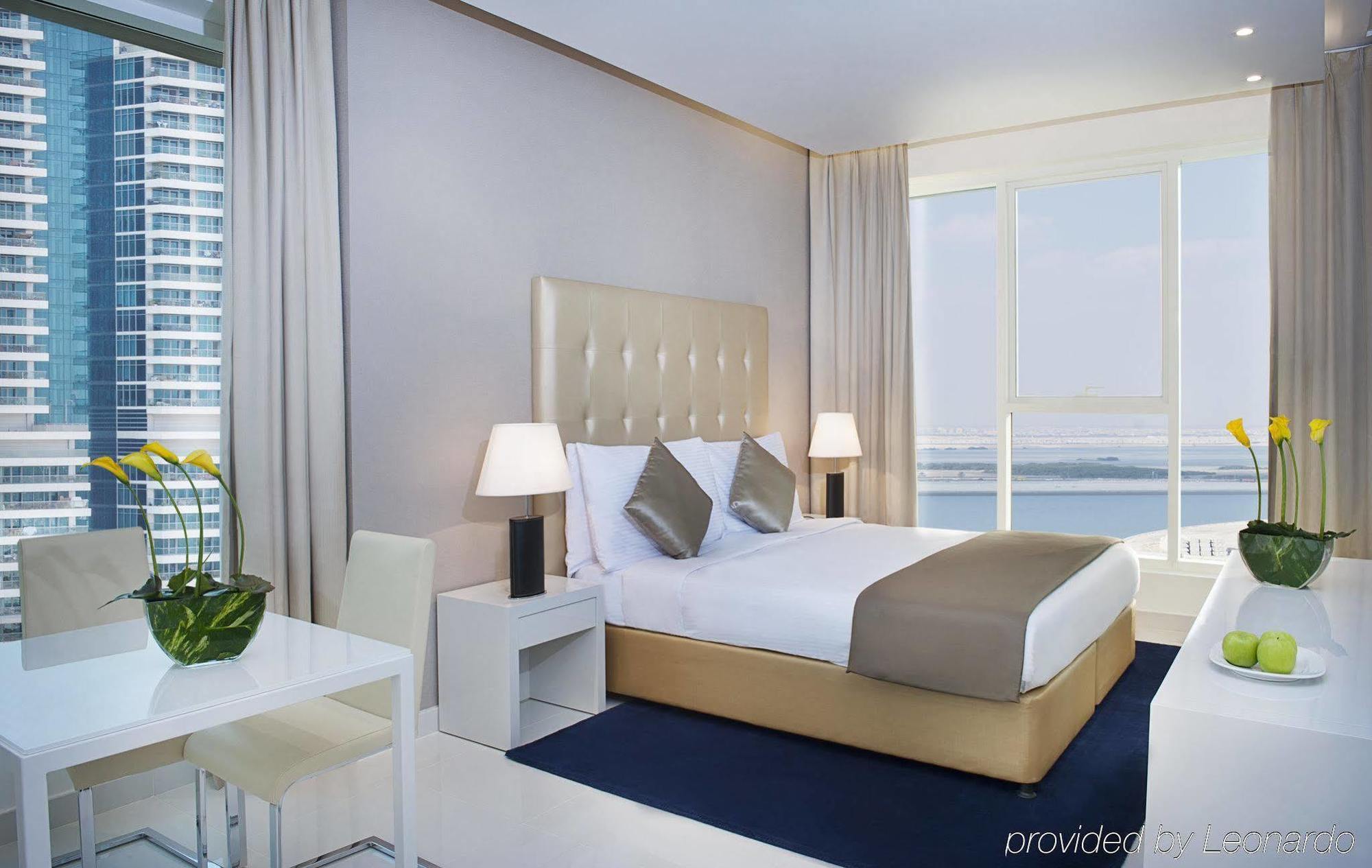 Damac Maison The Vogue ดูไบ ภายนอก รูปภาพ A bedroom at the Address Downtown Hotel