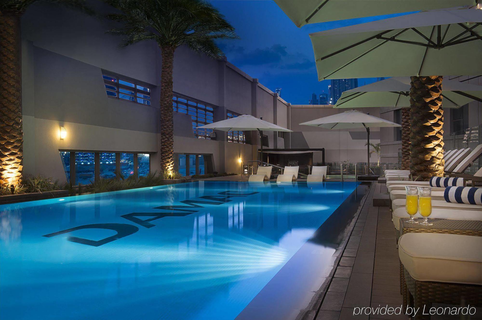 Damac Maison The Vogue ดูไบ ภายนอก รูปภาพ The pool at the hotel