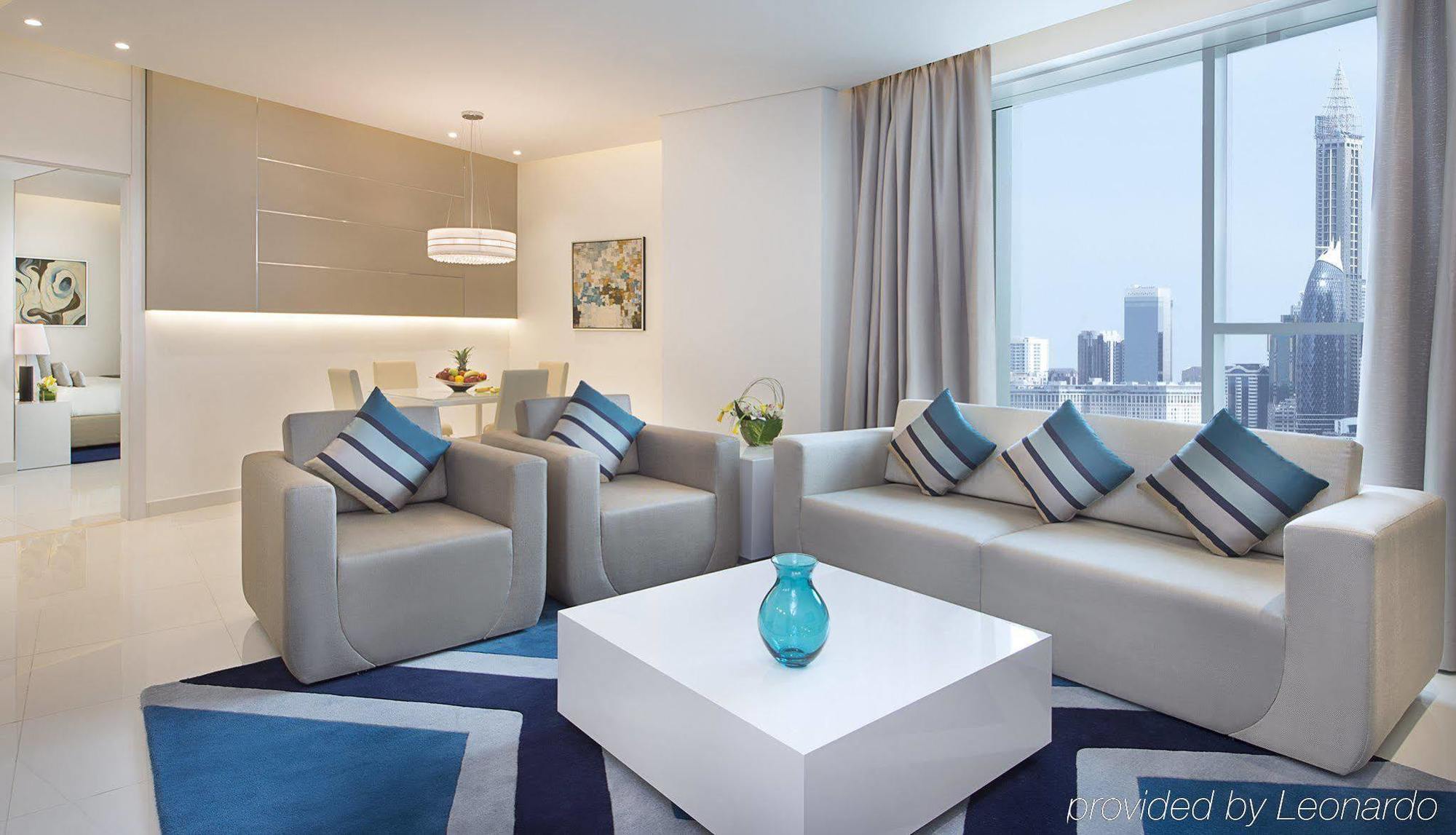 Damac Maison The Vogue ดูไบ ภายนอก รูปภาพ A living room