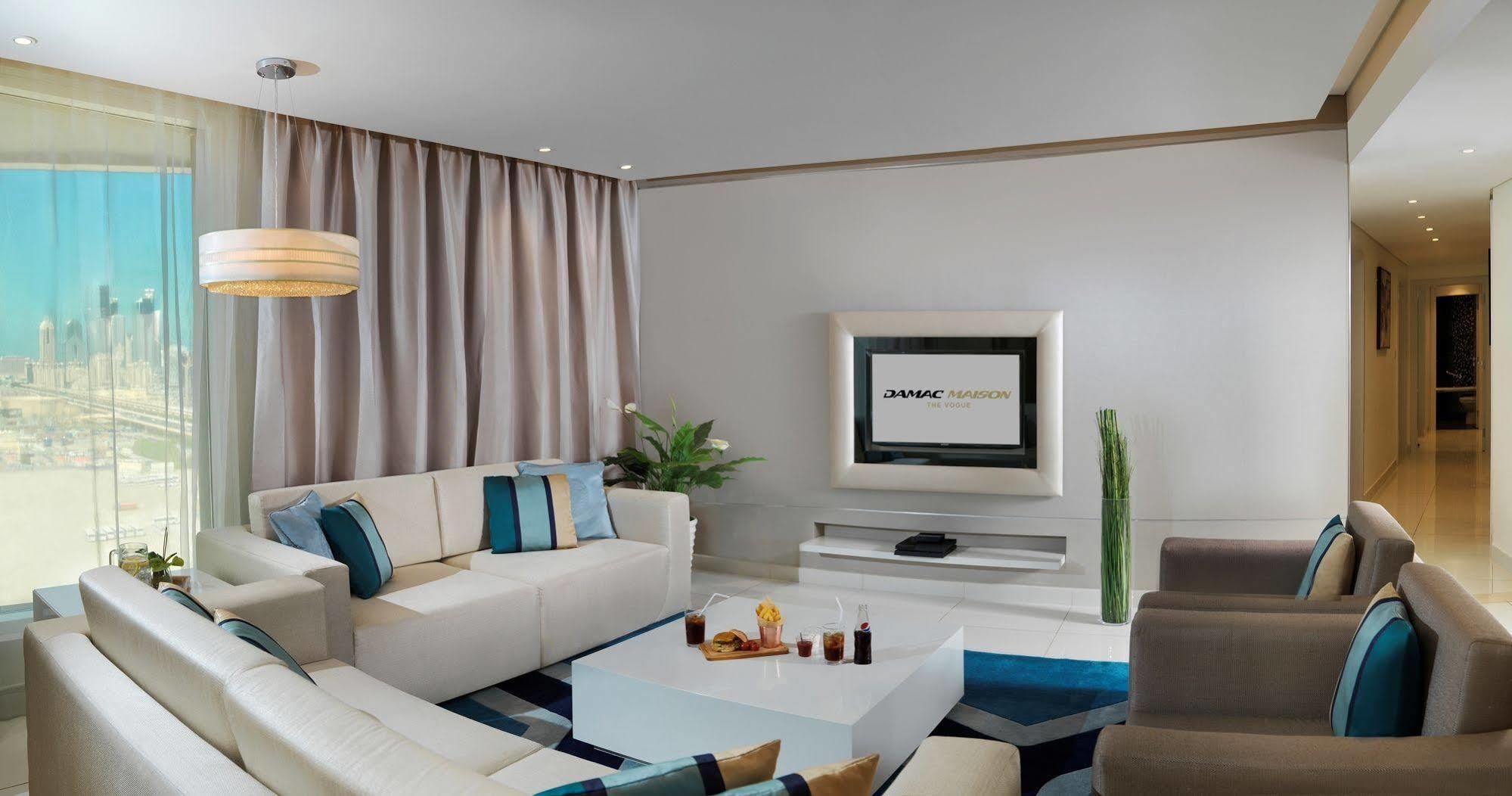 Damac Maison The Vogue ดูไบ ภายนอก รูปภาพ A living room