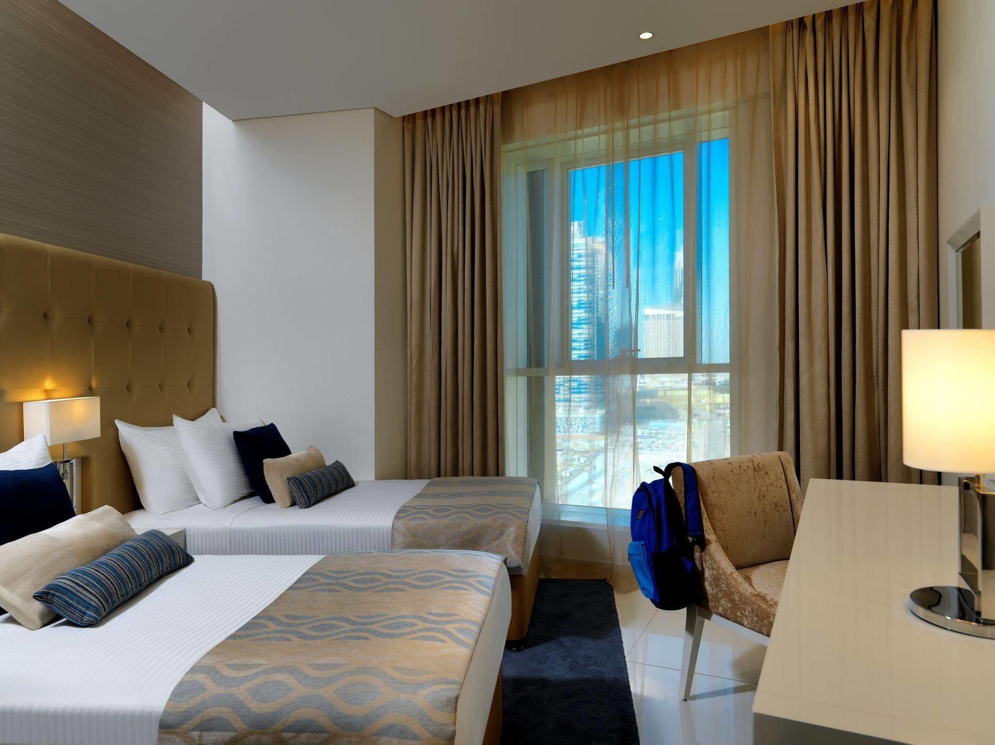 Damac Maison The Vogue ดูไบ ภายนอก รูปภาพ A room at the hotel